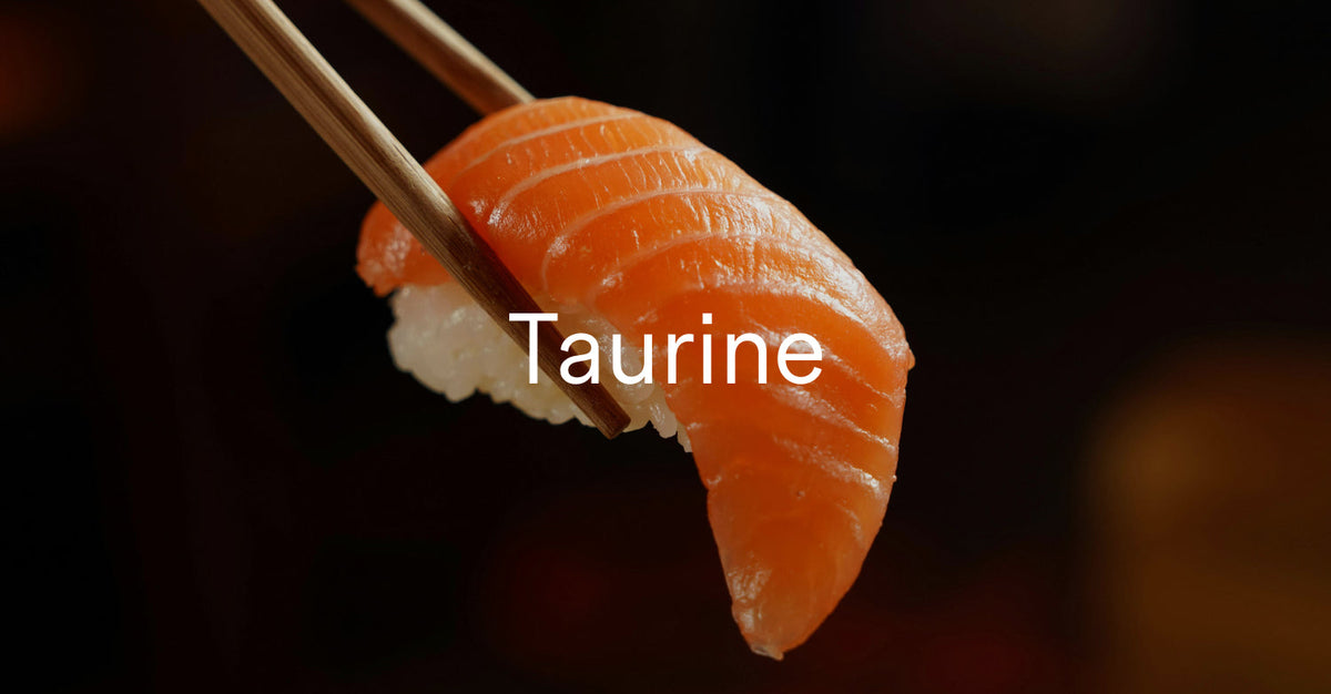 Salmon sushi being held on chopsticks with the word