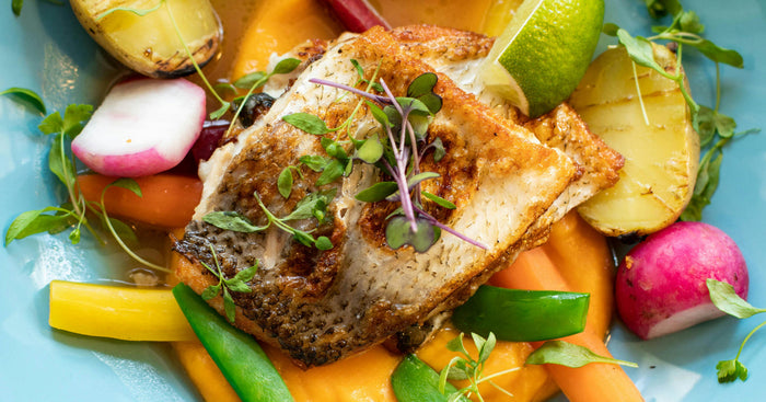 Grandmother, mother, and young daughter smiling together, representing female longevity across generations.